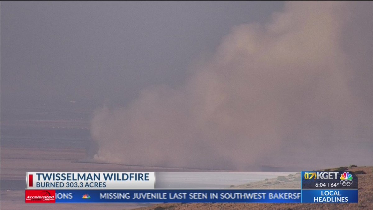 Firefighters continue to work on containing the flames of a wildfire in Buttonwillow called the Twisselman fire