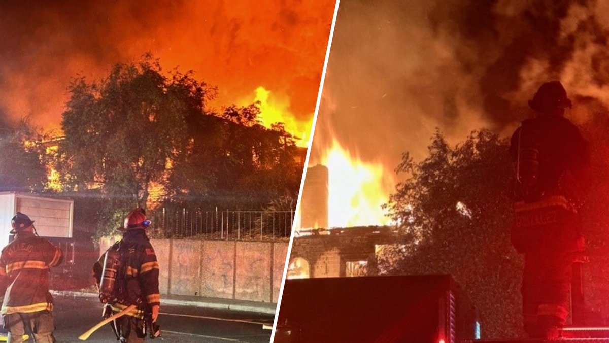 A two-alarm fire in Vallejo early this morning destroyed an abandoned home and damaged two neighboring houses, displacing a famiy of seven, according to fire officials