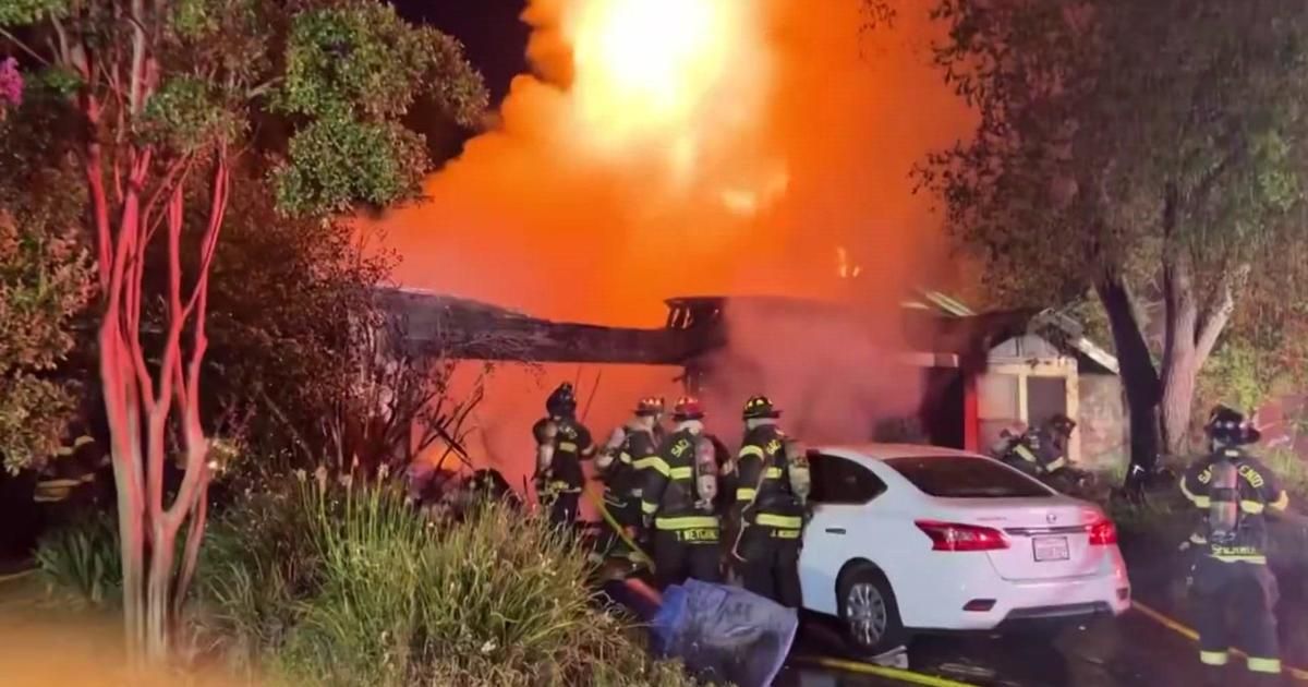 Fire burns garage, vehicle at South Natomas home