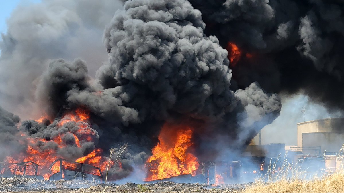 Fire off Georgia Pacific Way and Merlo Avenue. Large pile of materials burning