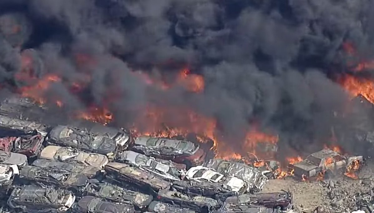 180 firefighters continue to battle 10 acres of burning salvage cars. Property is 20 acres   1,500 cars burned.Engine companies and specialized equipment are making significant progress. No injuries reported (from earlier in incident)Lancaster