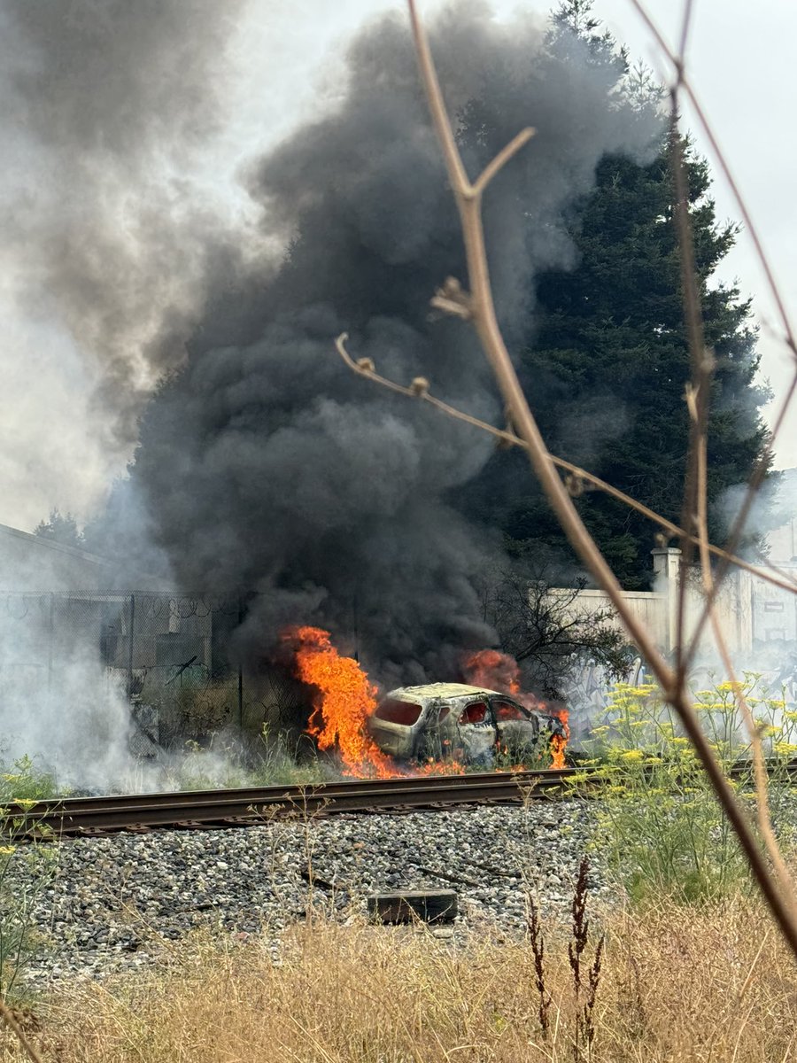 Engine 26 and Engine 20 extinguished an abandoned vehicle fire that began at 1145 AM on the railroad tracks in the area of Sobrante Park in East Oakland. The fire extended to nearby vegetation but crews successfully prevented it from threatening the homes and buildings close by