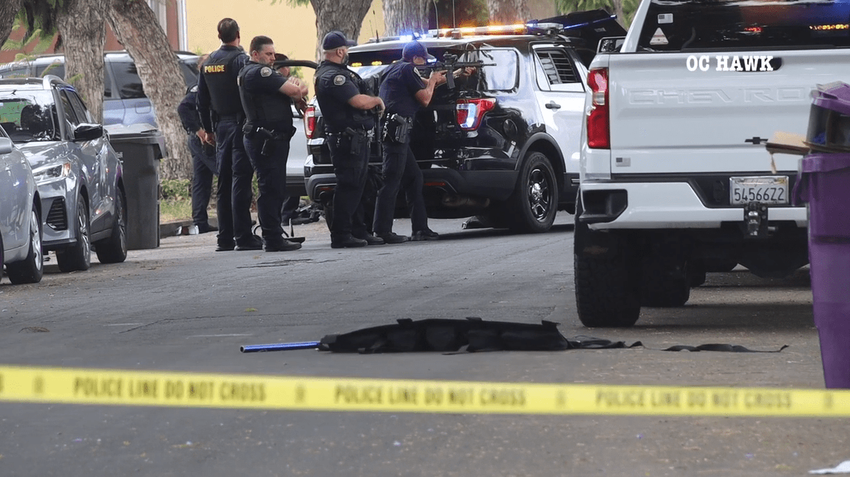 A double homicide suspect was found dead after barricading himself in a Long Beach home on Monday