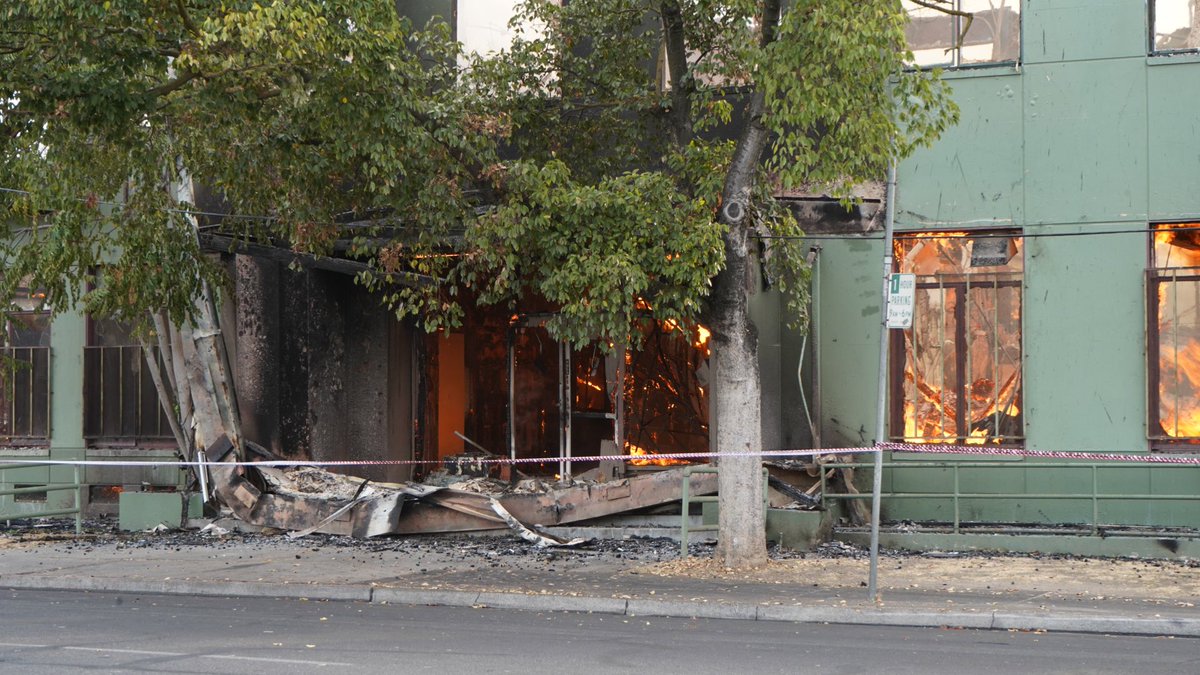 Nearly five hours after this vacant building in downtown Stockton erupted in flames, the fire is refusing to back down despite a 3-alarm response from firefighters. Crews say the structure, a block away from city hall, was under remodel and frequented by squatters