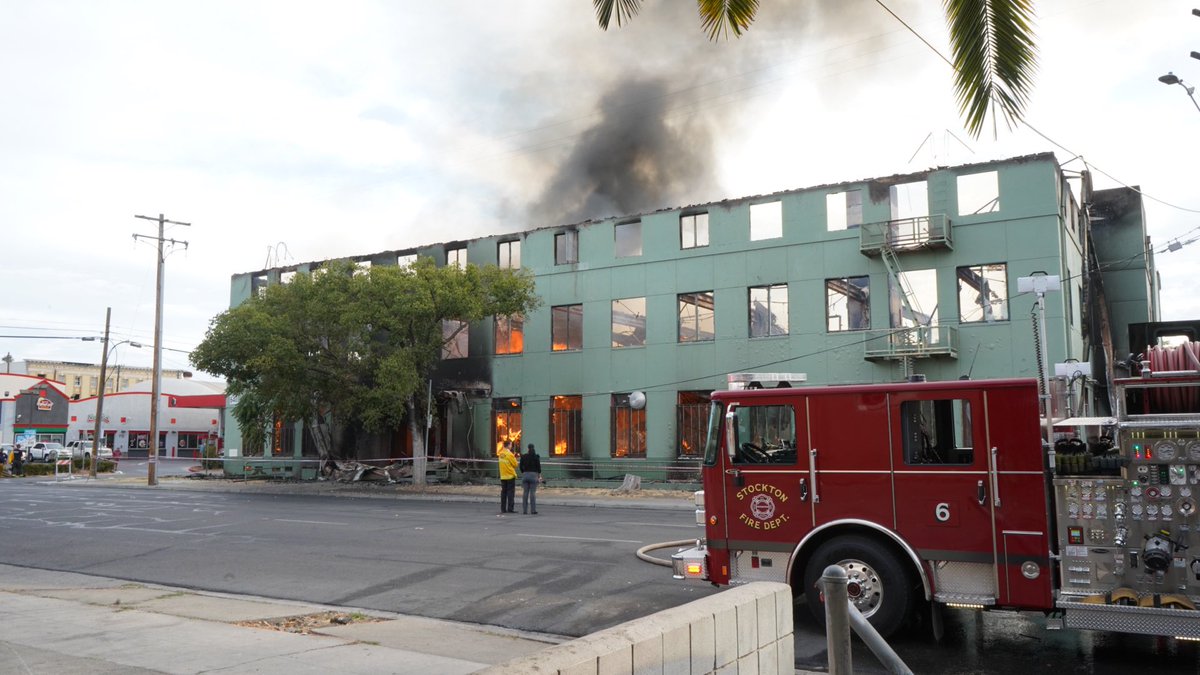 Nearly five hours after this vacant building in downtown Stockton erupted in flames, the fire is refusing to back down despite a 3-alarm response from firefighters. Crews say the structure, a block away from city hall, was under remodel and frequented by squatters