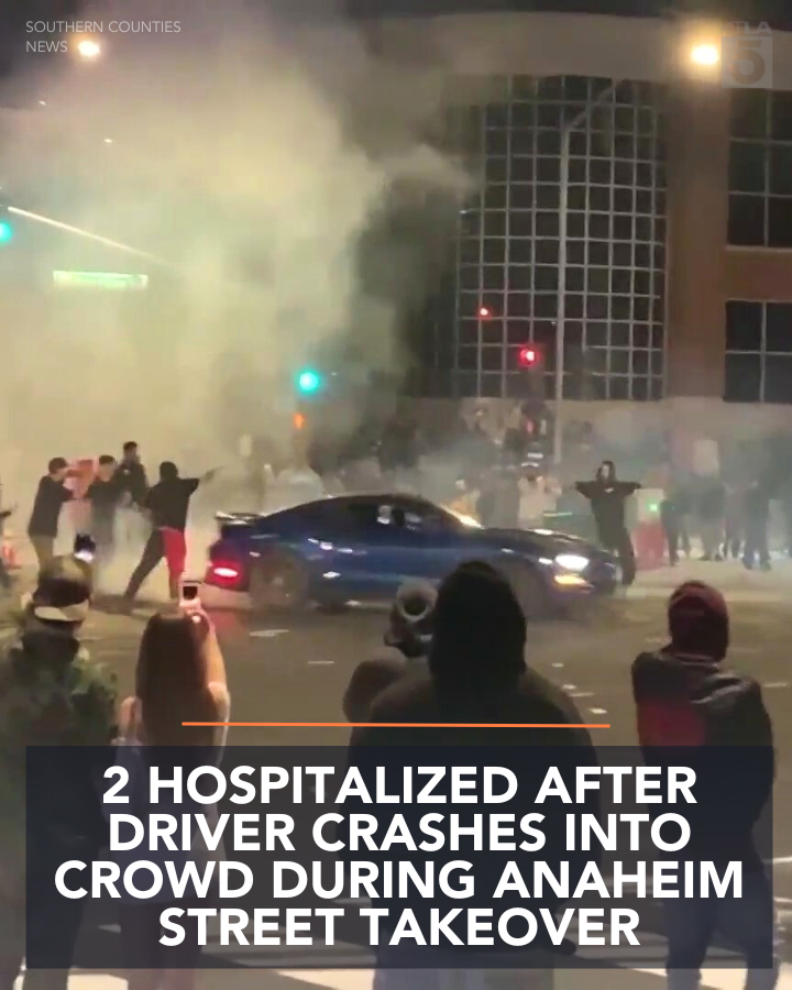 Two people were hospitalized after a driver crashed into a crowd during a chaotic street takeover in Anaheim