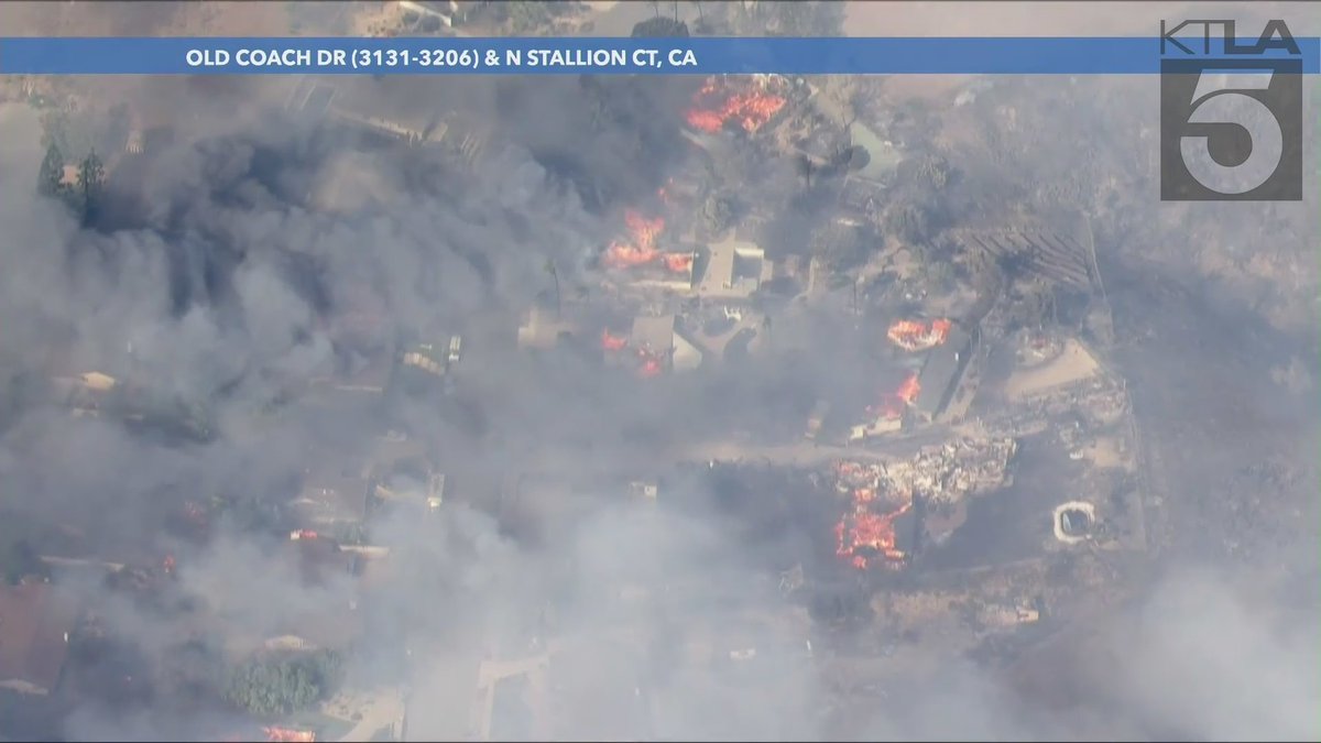 Sky5 reporter Rich Prickett has observed at least a dozen homes ablaze in the 1,500-acre MountainFire.