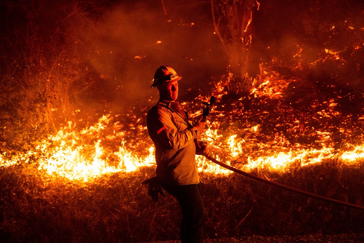 Thousands of people evacuated as wildfires ravage homes near Los Angeles