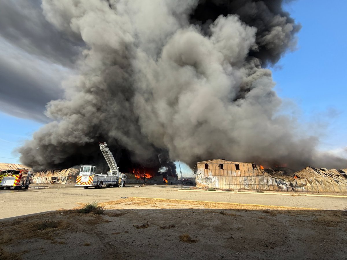 Bakersfield and Kern County fire departments are battling a two-alarm structure fire in east Bakersfield Saturday