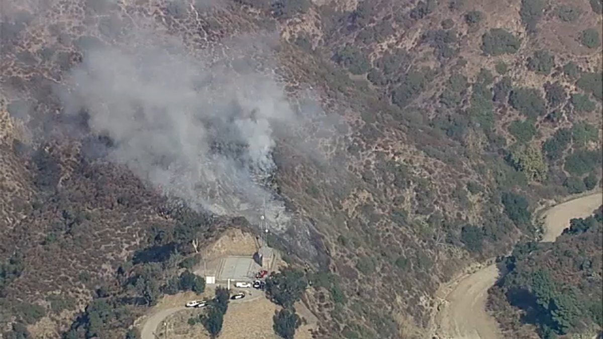 Firefighters are battling a small brush fire in Burbank, near S. Via Montana and Country Club Drive. No homes are threatened