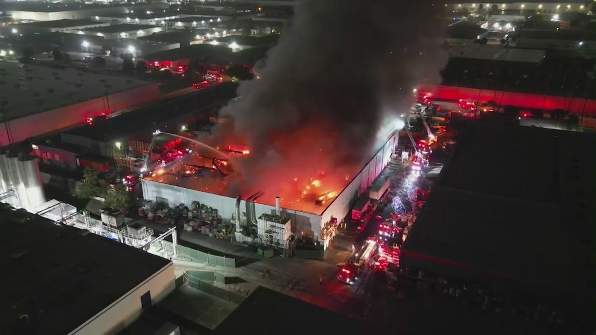 California warehouse fire sends toxic smoke into the air