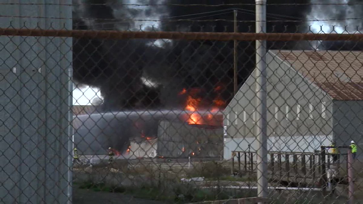 Firefighters are battling a fire at an abandoned warehouse on East Brundage Lane Wednesday afternoon