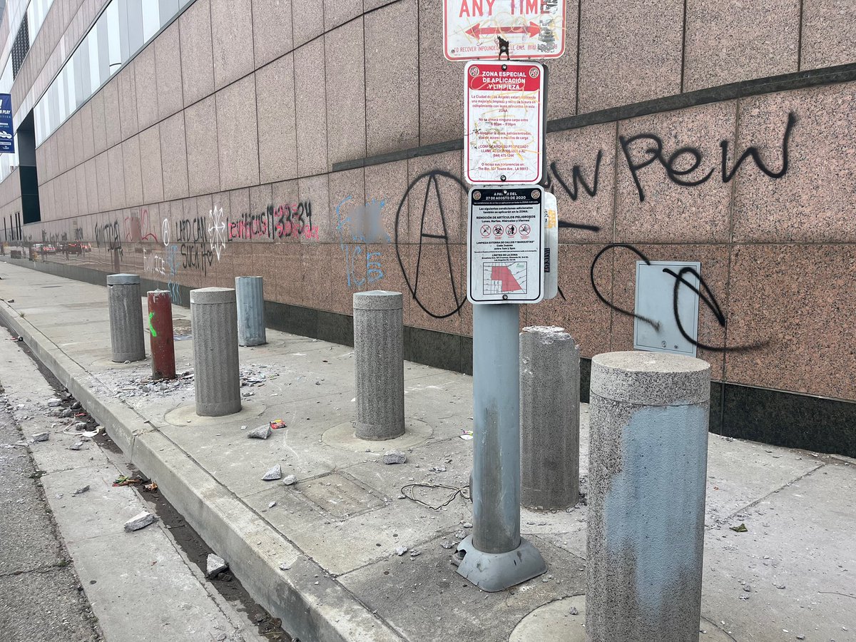 Vandalism outside the Federal Detention Center in downtown Los Angeles.  Much of the graffiti is anti ICE, police, and @elonmusk