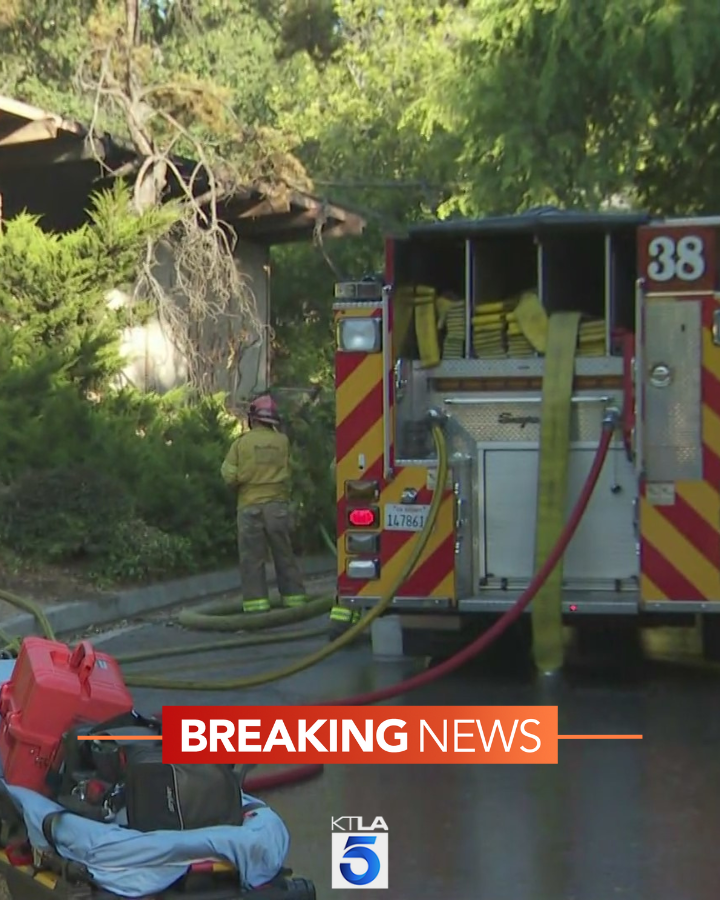 A person died after a house went up in flames in Pasadena early Saturday morning, according to authorities