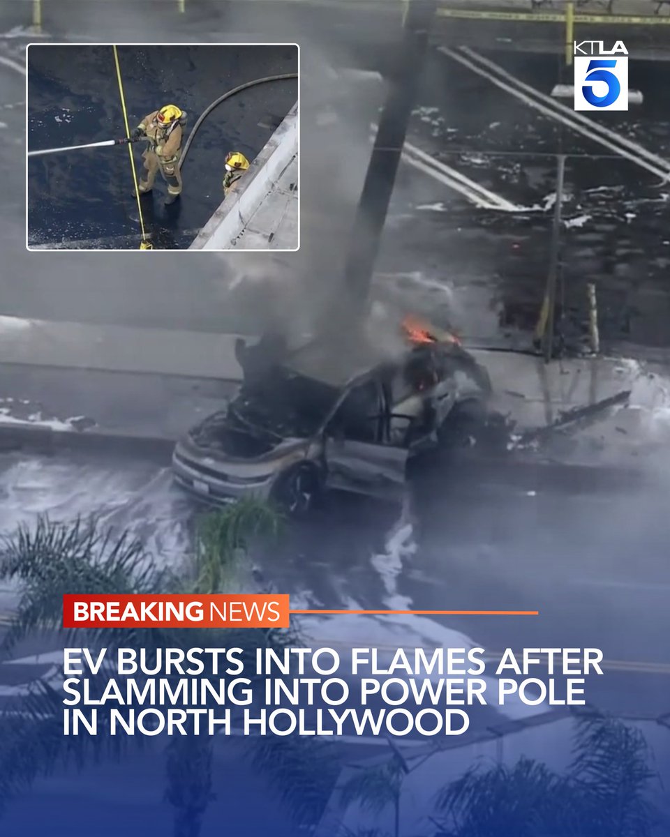 Firefighters in North Hollywood worked to extinguish a burning vehicle after it slammed into a power pole late Tuesday morning.