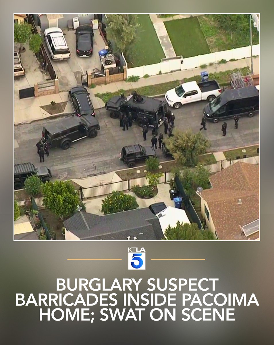 A burglary suspect barricaded himself inside a Pacoima home early Thursday morning, prompting a SWAT response and a large police presence in a residential neighborhood, according to police.