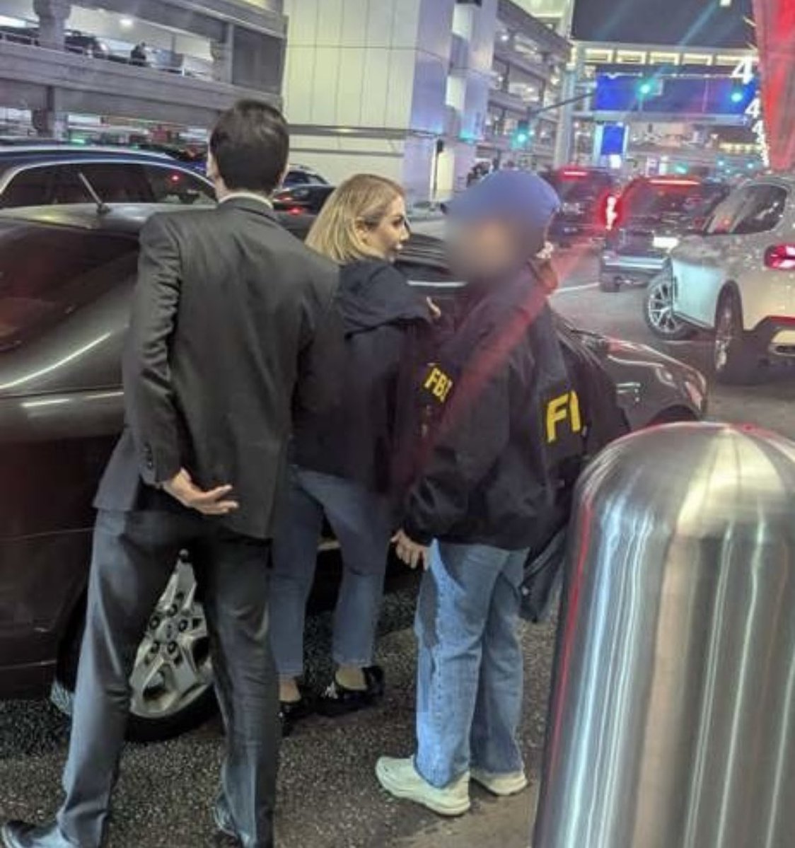 FBI agents arrested Iranian national Shamim Mafi at LAX on weapons trafficking charges, alleging she brokered Iranian-made drones, bombs, and ammunition sales to Sudan. She is set to appear in federal court and faces up to 20 years if convicted. 