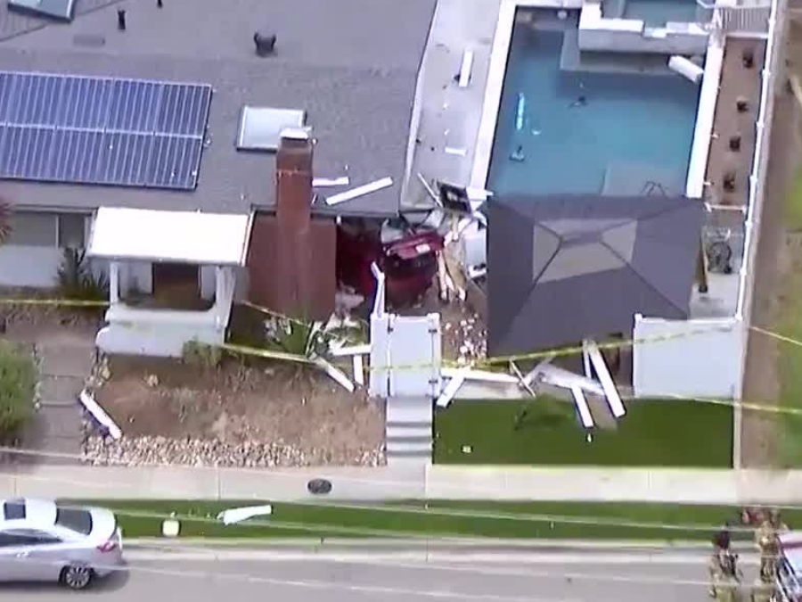 2-vehicle crash sends car into Clairemont home; 6 people hospitalized