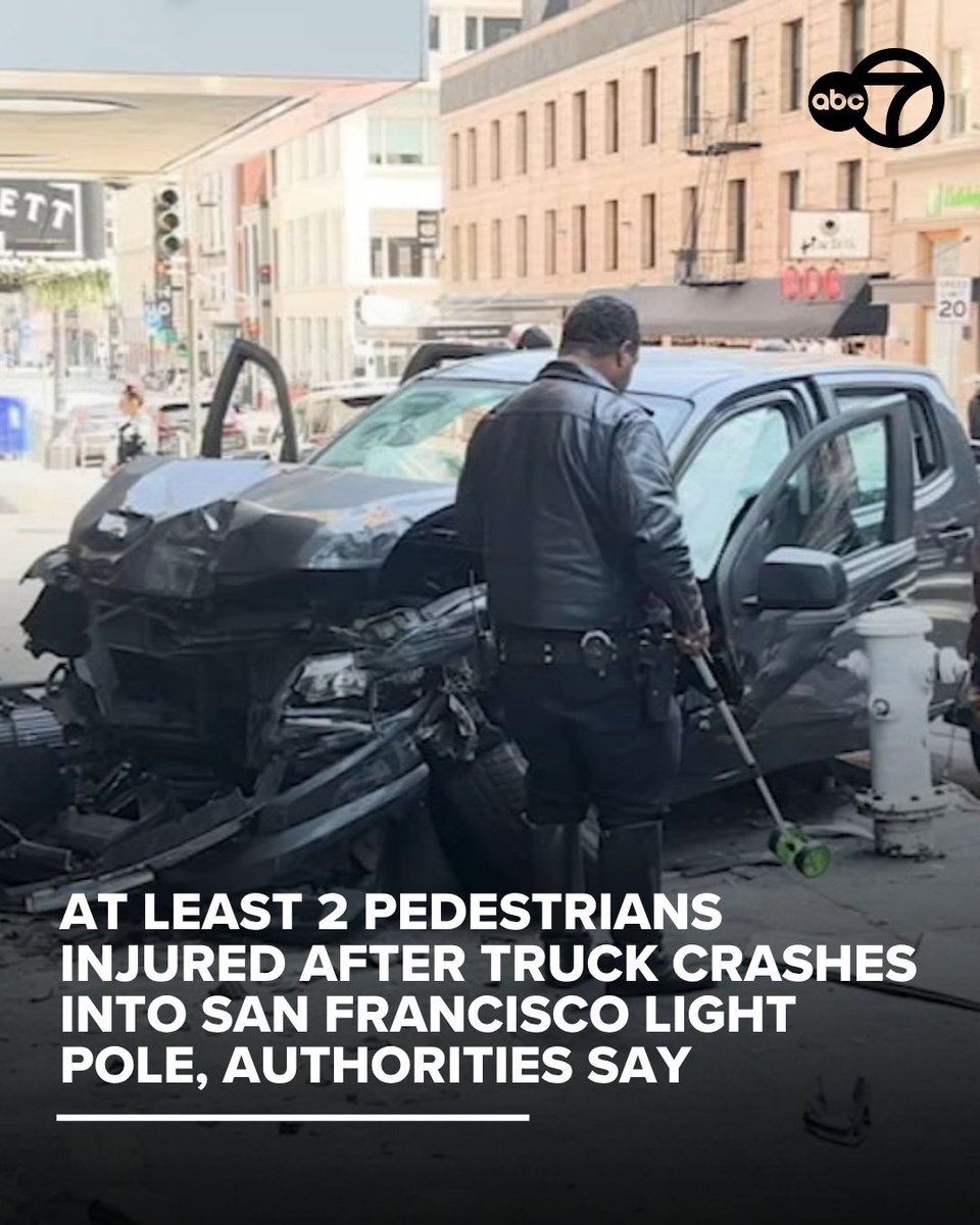 Two pedestrians are injured after a truck crashed into and damaged a street light pole in San Francisco on Sunday, authorities said.