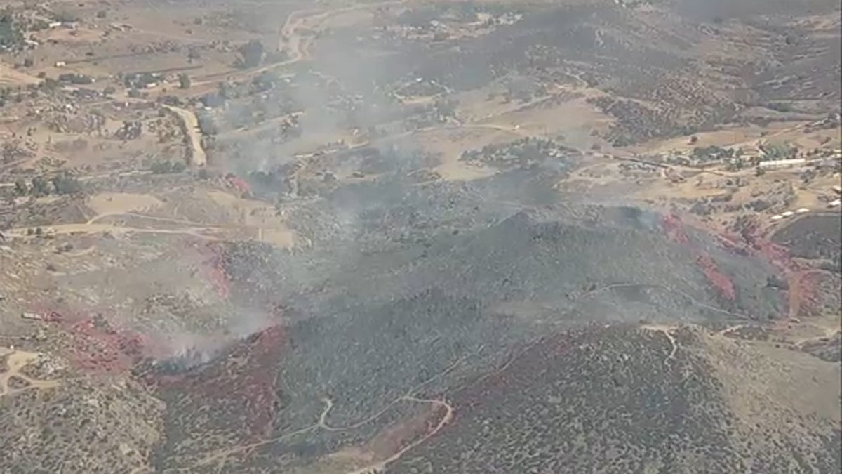 Evacuations downgraded as crews gain control of brush fire in Riverside County amid dangerous heat